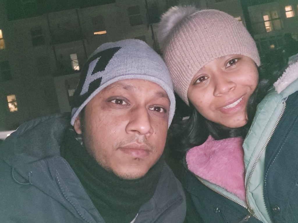 Renesh and Chanelle taking a selfie in the city