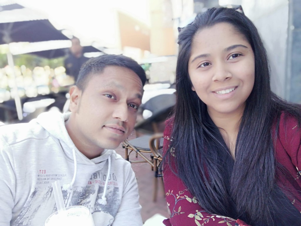 Renesh and Chanelle at an outdoor café